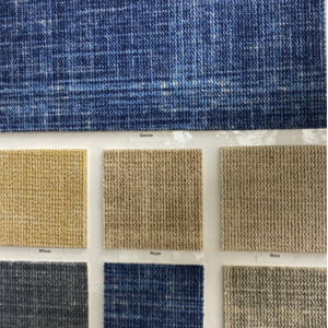 Luxury patterned carpet samples with blue and neutral woven textures at Designer's Carpet One in Mississauga, ON